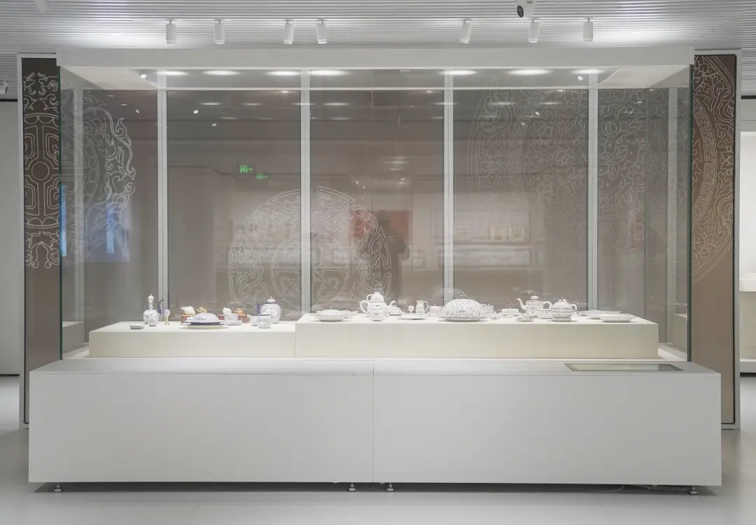 Large custom museum artifact display case with full glass enclosure for porcelain artifact collection